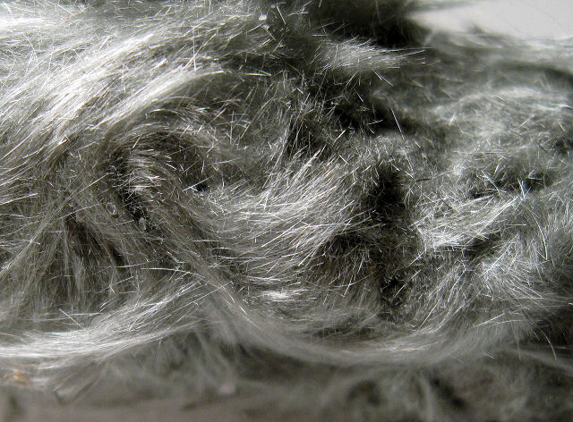 byssolite-gray hair-like crystals