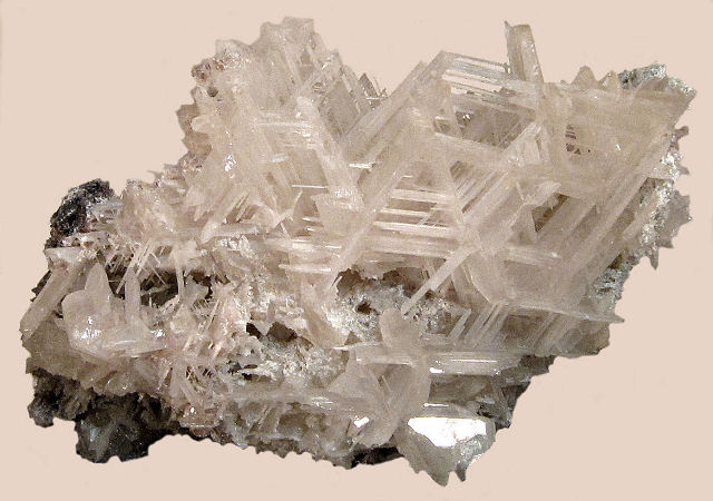 cerussite-hexagonal network of white crystals