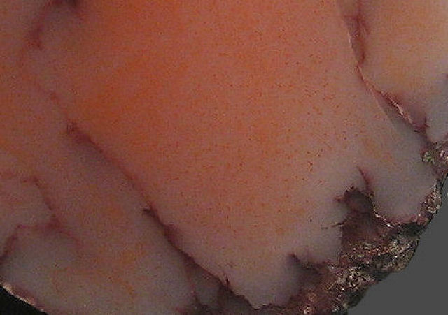 datolite-polished surface-red color from microscopic copper specks-Michigan