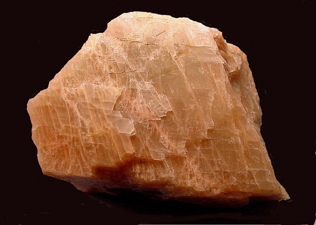 feldspar-pinkish orange cleavage fragment
