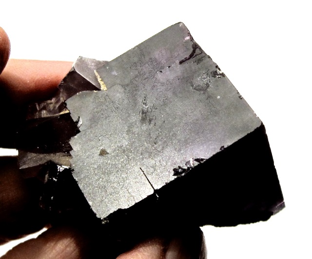 fluorite-cubic crystal-dark purple with brown surface