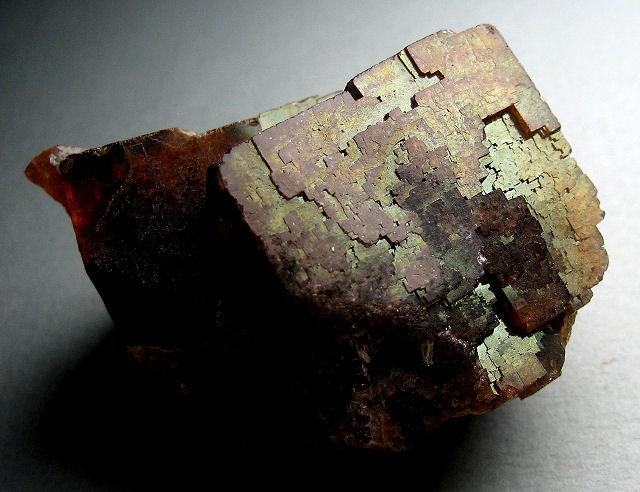 fluorite-cubic crystals-dark purple with brown surface