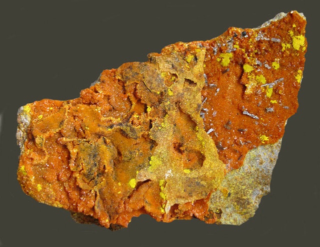 francevillite-cheralite-bright yellow patches on orange
