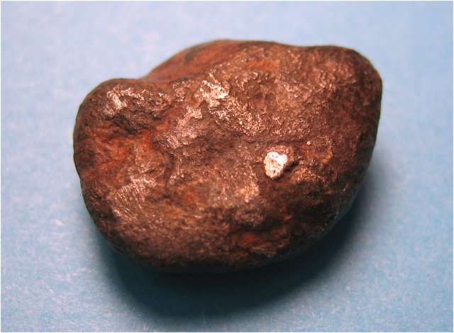 josephenite-small metallic nugget covered by iron oxide