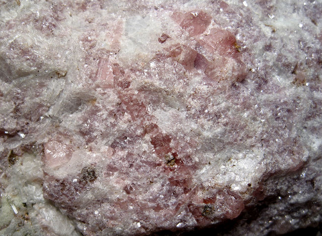 lepidolite light pink massive with dark pink tourmaline Pala California