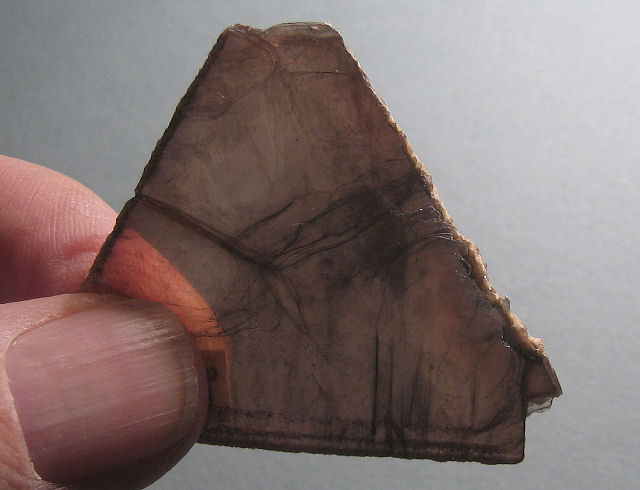lepidolite-translucent pinkish brown triangular crystal-Brazil