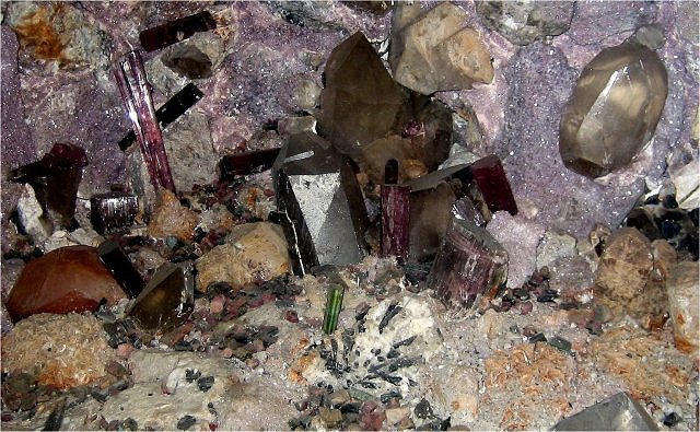 lepidolte vug with tourmaline and smoky quartz crystals Pala California