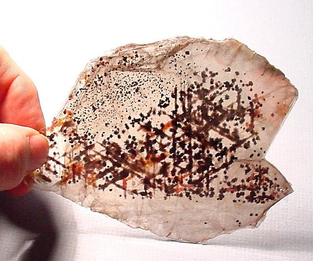 mica-muscovite-transparent sheet with hematite inclusions-1