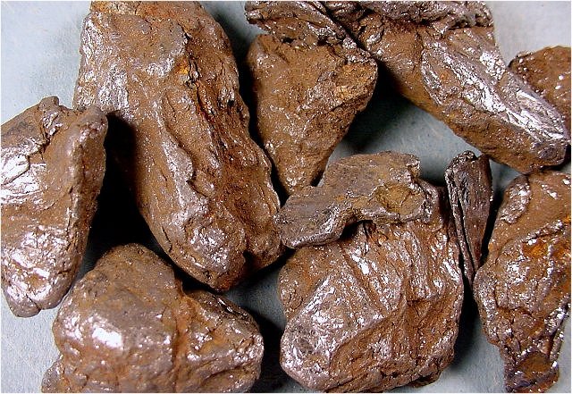 molybdenite-silvery fragments covered by brown dust-16