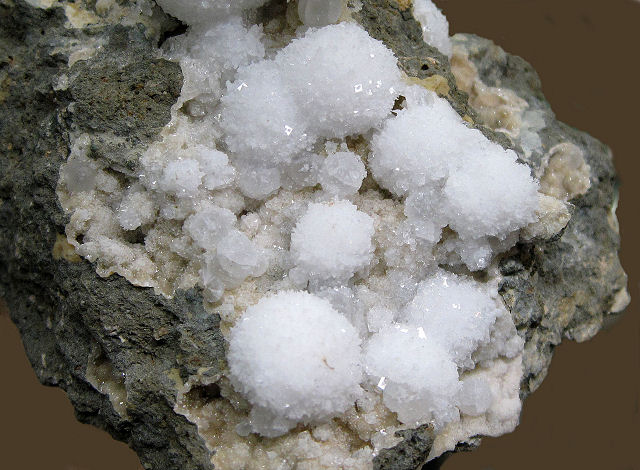 natrolite-white crystalline spheres