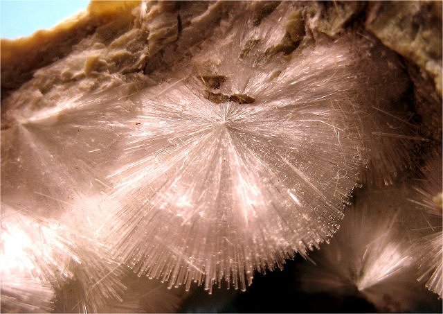 okenite-light pink radiating cluster of hair-thin crystals