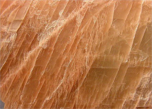 orthoclase-pinkish orange cleavage fragment