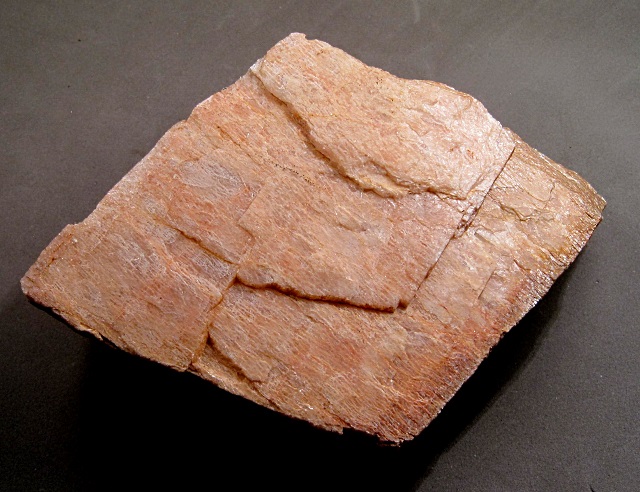 orthoclase-pinkish orange cleavage fragment