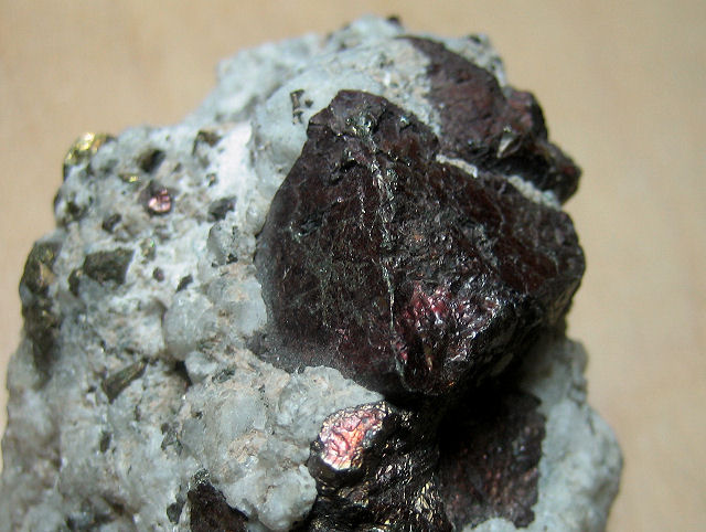 pyrite octahedron crystal with black coating