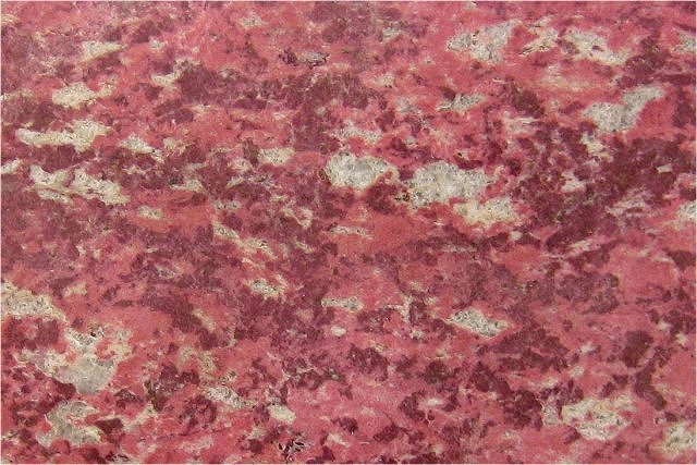 zoisite cut slab dull red