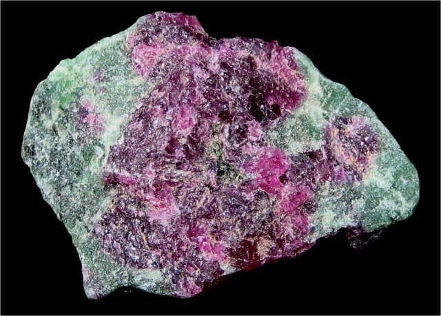zoisite green massive with bright pink rubies Africa