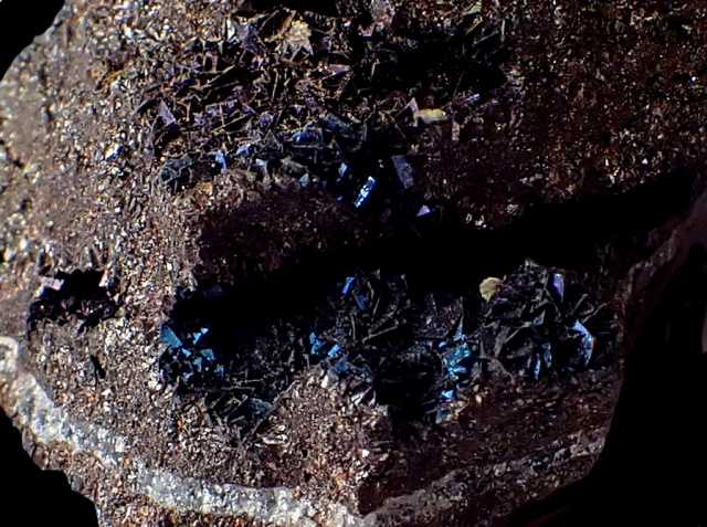 siderite-brown crystals- iridescent coating