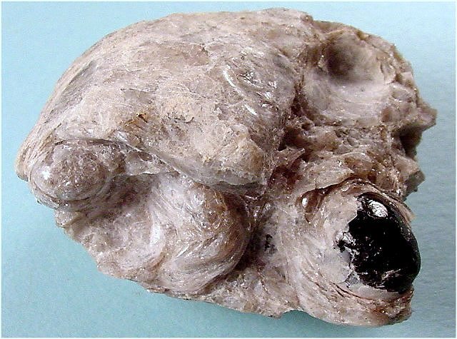Obsidian - Apache tear inside of Perlite