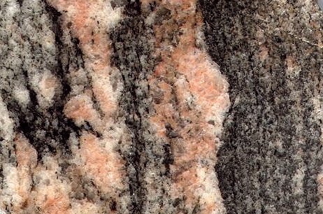 gneiss pink and black foliated close up